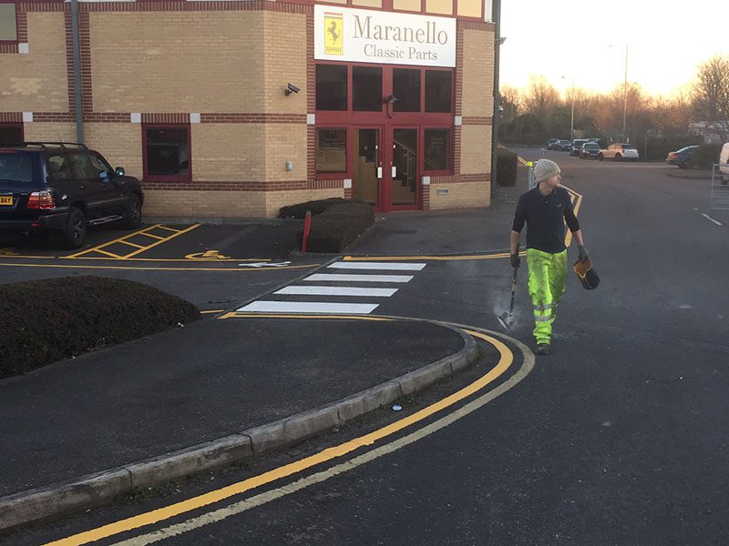 Private road markings on an industrial estate access road