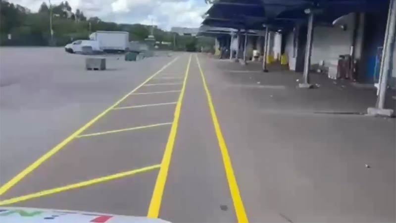 Warehouse walkway floor marking in yellow line paint